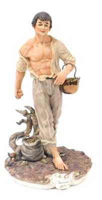 Lot 72 - A Capodimonte porcelain figure of a...