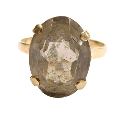 Lot 188 - A 9ct gold and smokey quartz ring, the oval...