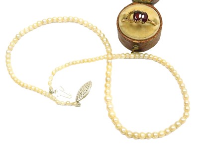 Lot 190 - A string of graduated cultured pearls, on a...