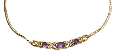 Lot 197 - A three stone amethyst and diamond necklace,...