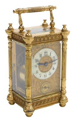 Lot 113 - A late 19thC brass cased alarm carriage clock,...