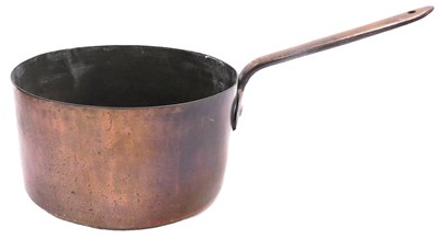 Lot 161 - A late 19thC copper saucepan, with a cast iron...