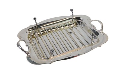 Lot 54 - An Edward VII silver twin handled asparagus...