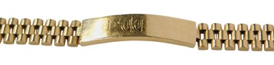 Lot 99 - An identity bracelet, the rectangular plaque...