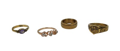 Lot 105 - Four dress rings, comprising one set with...