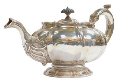 Lot 2 - A George IV silver teapot, of bellied fluted...