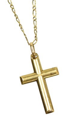 Lot 368 - A 9ct gold pendant cross, on a figaro link...
