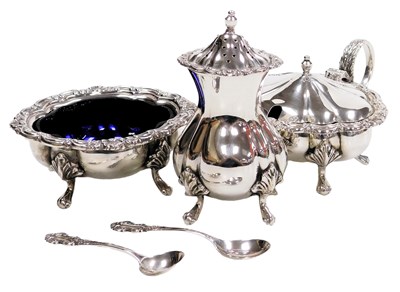 Lot 202 - An Elizabeth II silver three piece condiment...