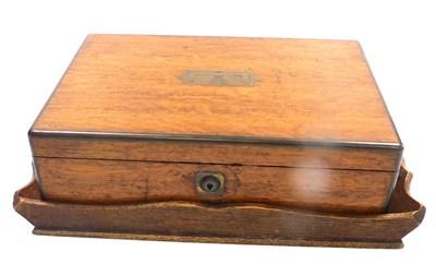 Lot 229 - A Victorian oak and brass bound box, the lid...