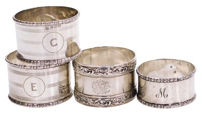 Lot 261 - A pair of George V silver napkin rings, with...