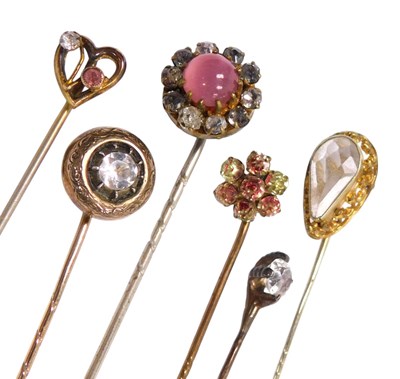 Lot 594 - Six Victorian and later tie pins, mostly paste...
