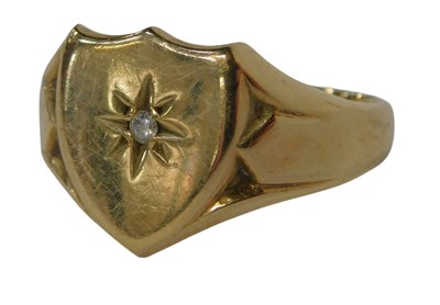 Lot 116 - A 9ct gold and diamond shield shaped ring,...