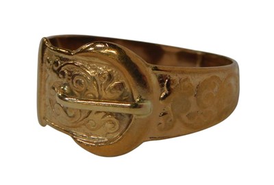 Lot 119 - A 9ct gold belt and buckle ring, decorated...