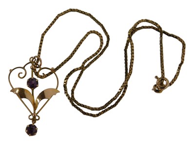 Lot 125 - An Art Nouveau pendant of floral design, set...