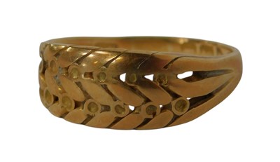 Lot 129 - An 18ct gold dress ring, lacking stones, size...