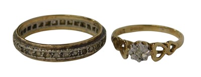 Lot 130 - Two dress rings, comprising a white paste...