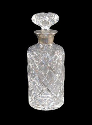 Lot 43 - A 20thC cut glass decanter, with a silver...