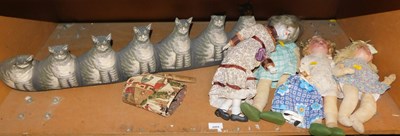 Lot 2004 - A group of dolls, together with a tabby cat...