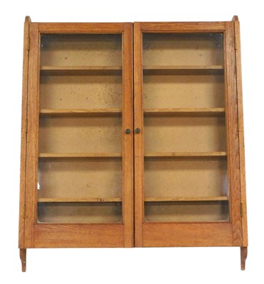Lot 708 - An early 20thC oak wall cabinet, with two...