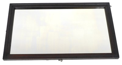 Lot 710 - A 19thC dark stained wall mirror, with moulded...