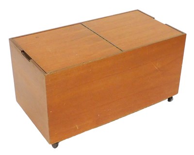 Lot 713 - A 1970s teak worktable or chest, with double...