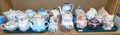 Lot 2049 - A group of novelty and other teapots, to...
