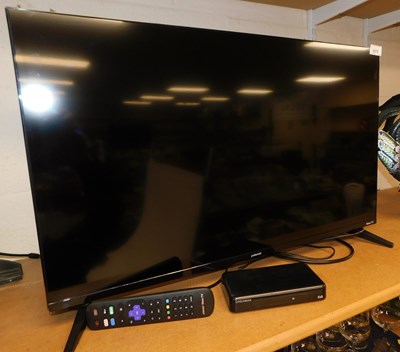 Lot 2075 - A Polaroid 42.5" Roku TV, with lead and remote,...