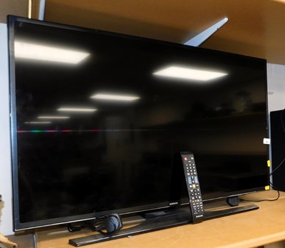 Lot 2082 - A Samsung 40" television, with lead and remote.
