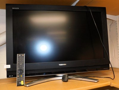 Lot 2085 - A Toshiba 31" Regza television, with leads and...