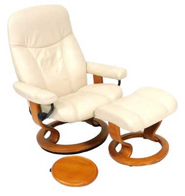 Lot 729 - A Stressless cream leather adjustable armchair...