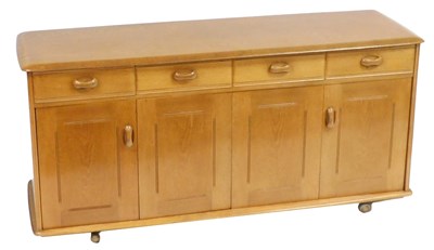 Lot 519 - An elm sideboard, the rectangular top with...