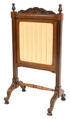 Lot 733 - A Victorian rosewood fire screen, with a shell...