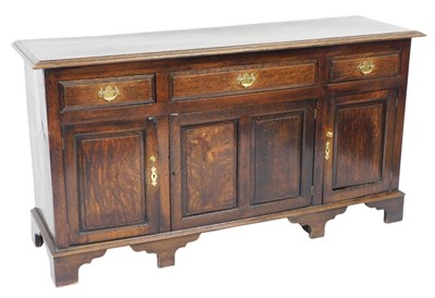 Lot 520 - An early 19thC oak dresser base, the...