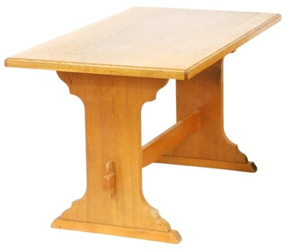 Lot 510 - A light oak refectory table, the rectangular...
