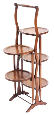 Lot 764 - An Edwardian mahogany two sided folding cake...