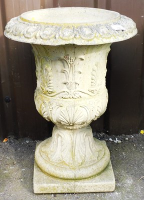 Lot 799 - A composition garden urn, cast with acanthus...