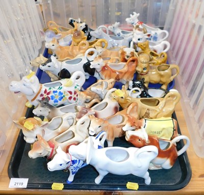 Lot 2119 - A group of ceramic cow creamers, to include...