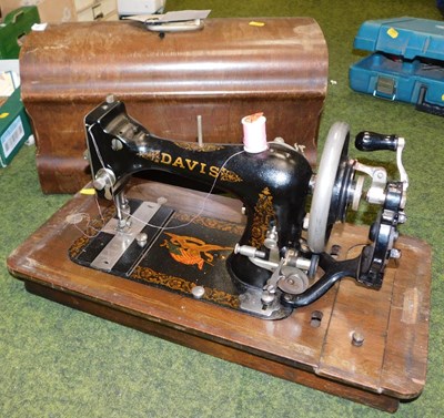 Lot 2134 - A cased Davis sewing machine.