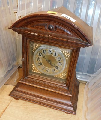 Lot 2149 - An early 20thC oak cased mantel clock, the...