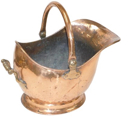 Lot 397 - A Victorian copper helmet shaped coal skuttle,...