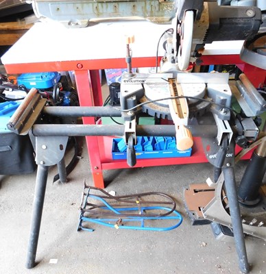 Lot 806 - An Evolution electric mitre saw and stand. (AF)