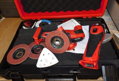 Lot 1160 - An Einhell cordless grinder, with some...