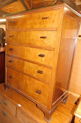 Lot 1010 - A 1930s walnut chest of five long drawers,...