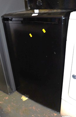 Lot 1014 - A fridge, in black.