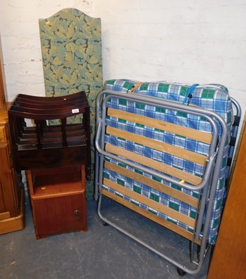 Lot 1032 - A Z bed, together with a four fold screen,...