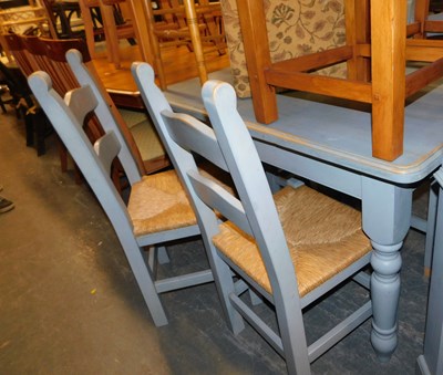Lot 1061 - A blue painted pine kitchen table, the top...