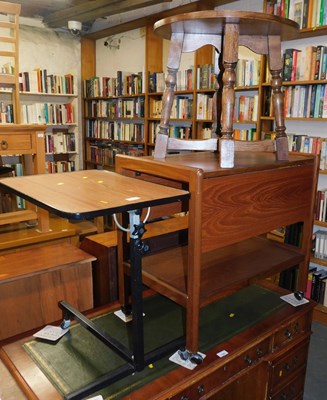 Lot 1069 - A teak drop leaf trolley, together with an oak...