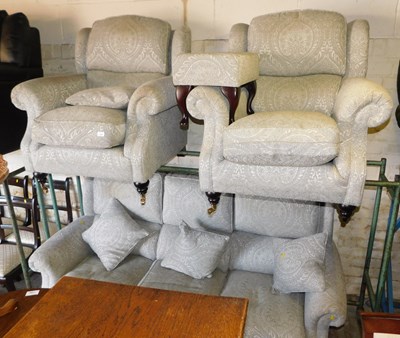 Lot 1095 - A Parker Knoll sofa suite, comprising a three...
