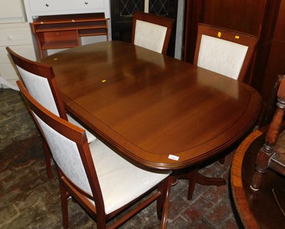 Lot 1107 - A hardwood extending twin pedestal dining...