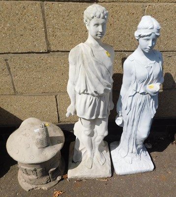Lot 1113 - Two garden statues, comprising a male and...